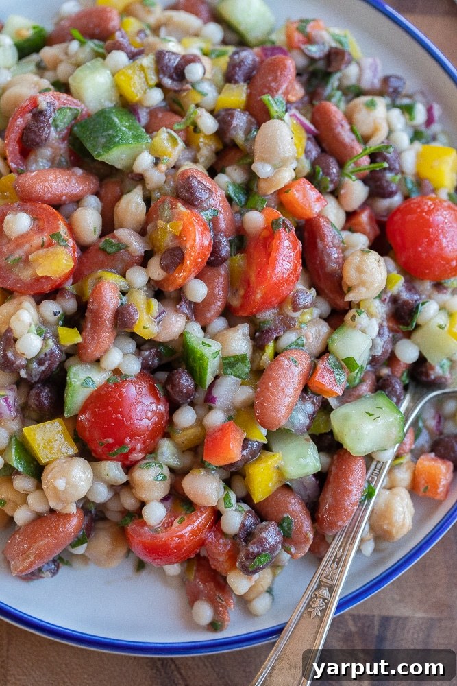 Mediterranean Pearl Couscous with Four Beans 6 close up of a plate of four bean salad with veggies and couscous