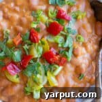 Delicious Cheesy Beans with Rice in a bowl, ready to serve.