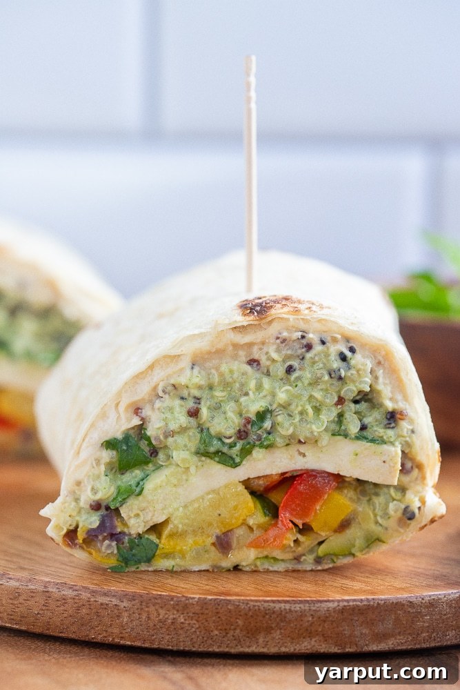 Protein-Packed Veggie Wraps 7 close up of a high protein vegetarian wrap that has been cut in half