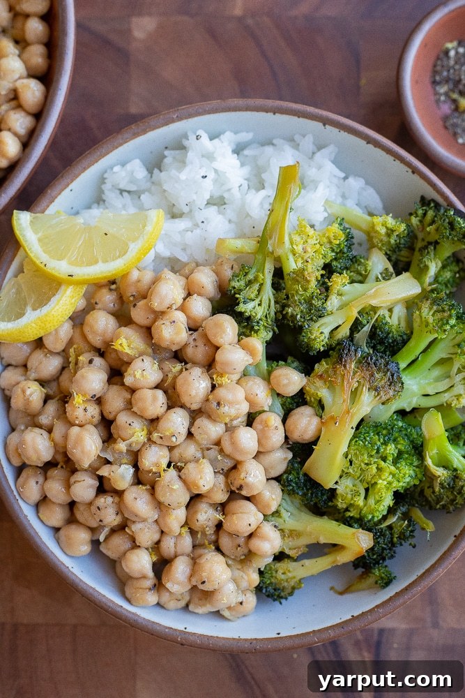 Effortless Plant-Based Meals Week 11 4 Marinated Lemon Pepper Chickpeas in a bowl with fresh herbs