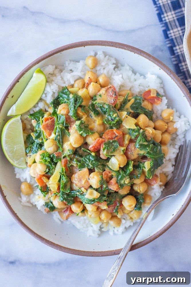 A World of Lentil Chickpea and Bean Delights 27 A vibrant bowl of quick and easy chickpea curry with fresh kale.