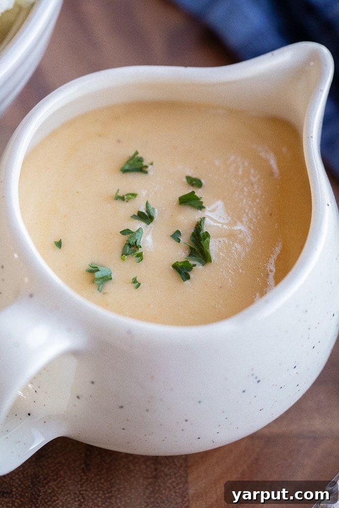 The Ultimate Vegetarian Gravy 6 close up of a saucer of vegetarian gravy, ready to be served