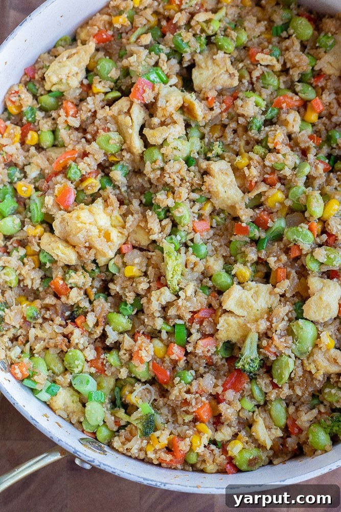 close up of a pan of homemade fried rice showing texture and color