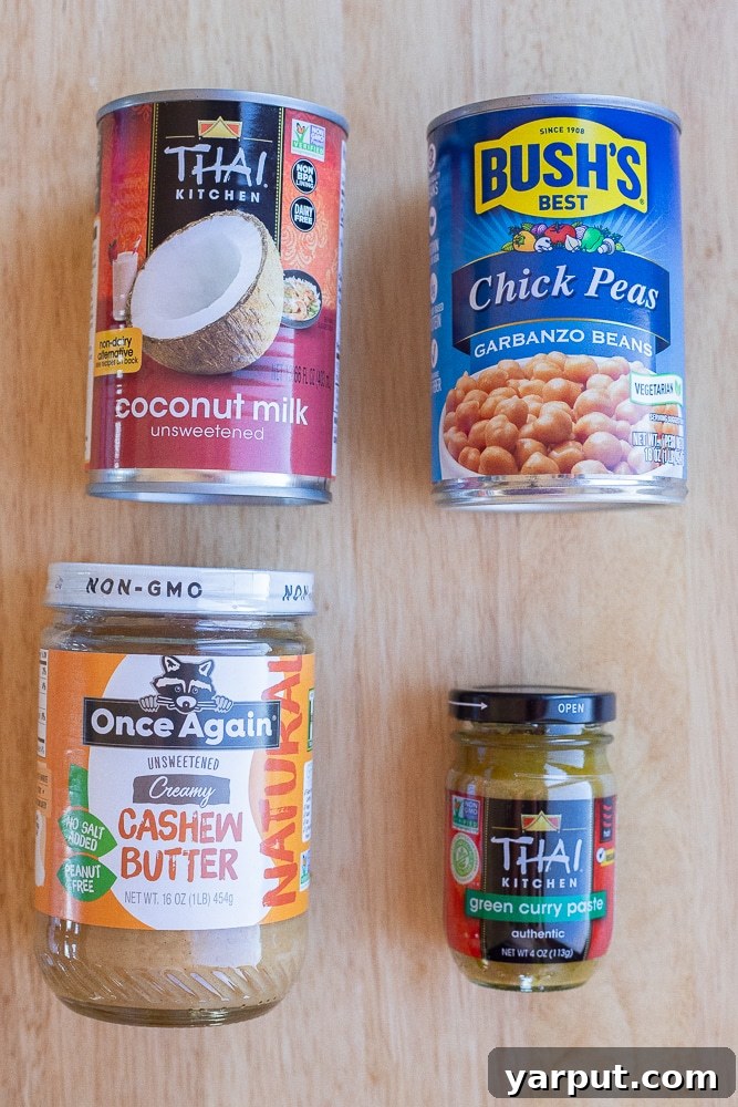 Fragrant Green Curry Chickpeas in Minutes 3 Main ingredients for quick and easy vegan green curry: green curry paste, coconut milk, cashew butter, and chickpeas.
