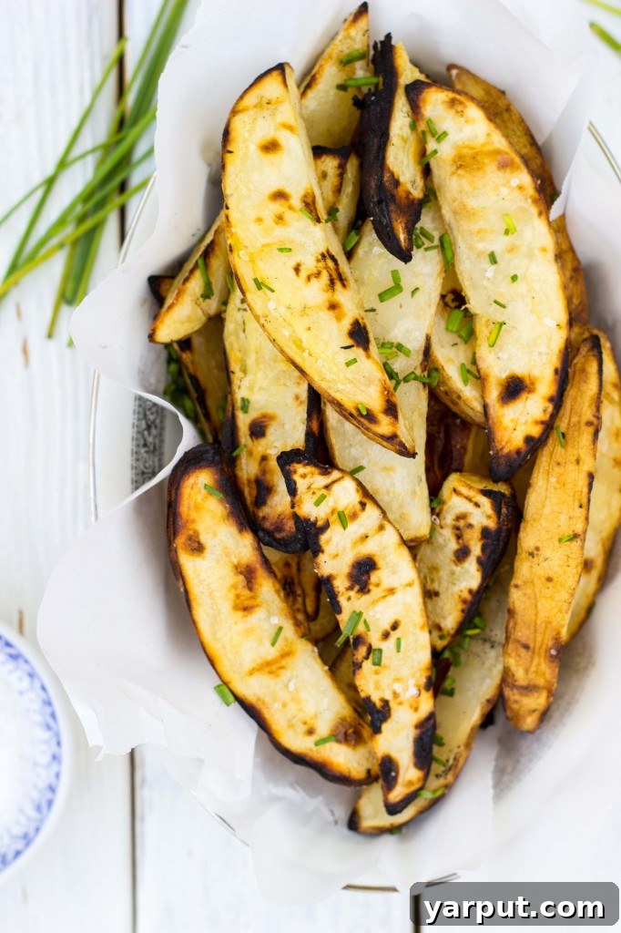 Zesty Salt and Vinegar Char-Grilled Potato Wedges 2 Deliciously tangy and smoky Salt & Vinegar Grilled Potato Wedges, perfect for any summer meal.