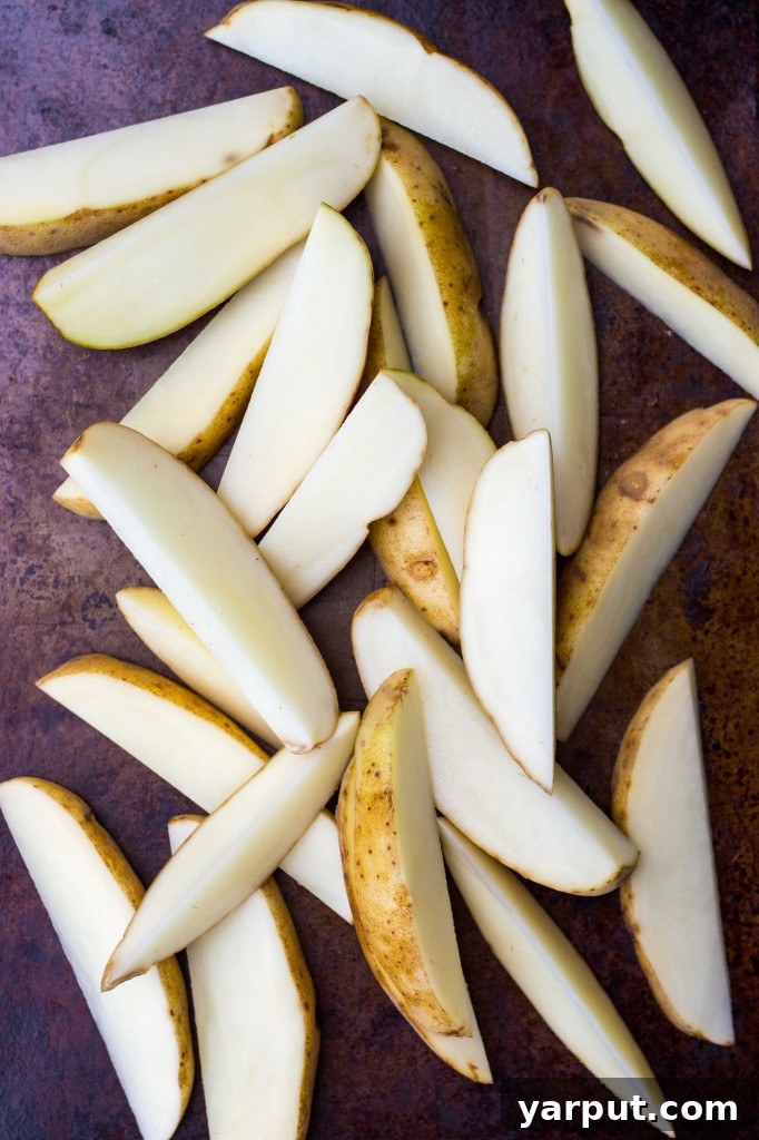 Zesty Salt and Vinegar Char-Grilled Potato Wedges 4 Hand seasoning grilled potato wedges with coarse sea salt.