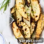 Perfectly golden and crispy Salt & Vinegar Grilled Potato Wedges.