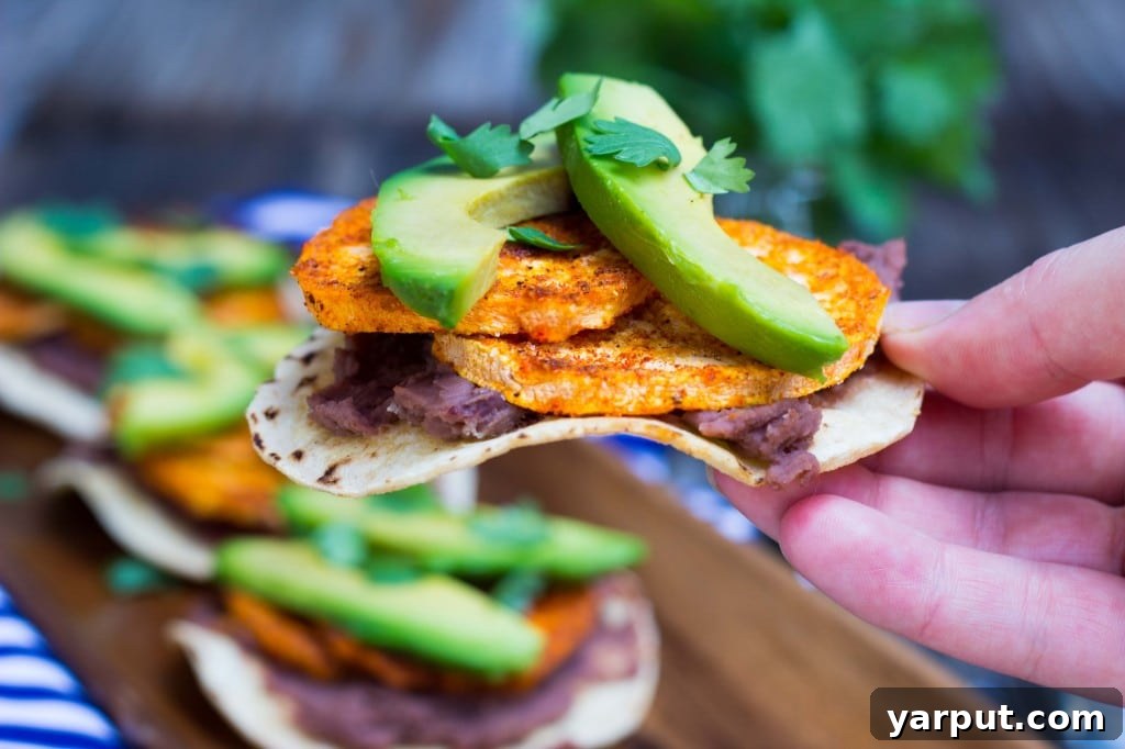 Perfect Roasted Sweet Potato, Black Bean and Avocado Tostadas 12 Close-up of a completed Roasted Sweet Potato, Black Bean & Avocado Tostada