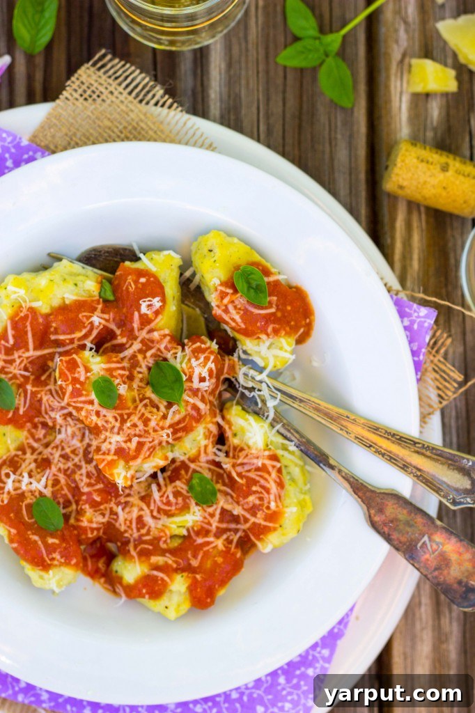 Pillowy Basil Sweet Corn Gnudi with Vibrant Blistered Tomato Sauce 12 Gourmet presentation of Basil & Sweet Corn Gnudi with a vibrant sauce