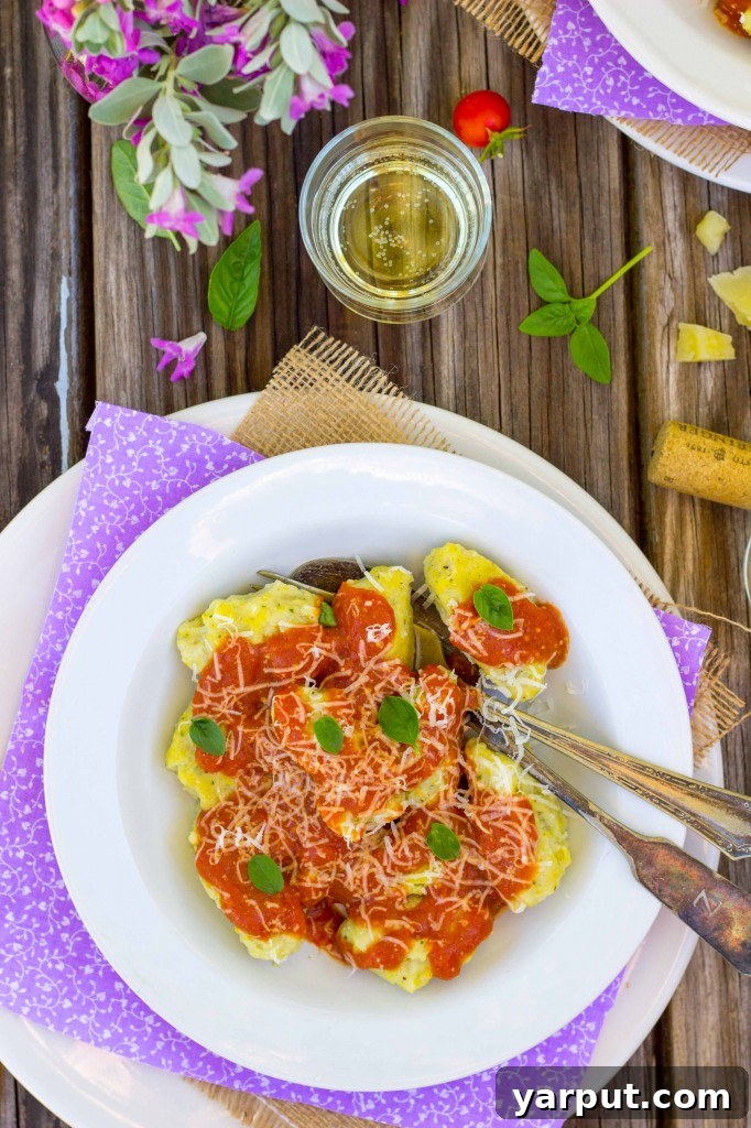 Pillowy Basil Sweet Corn Gnudi with Vibrant Blistered Tomato Sauce 9 A large platter of Basil and Sweet Corn Gnudi, ready for serving