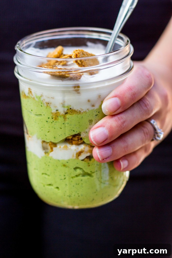 Refreshing Lime Cheesecake Parfaits, stacked in a glass