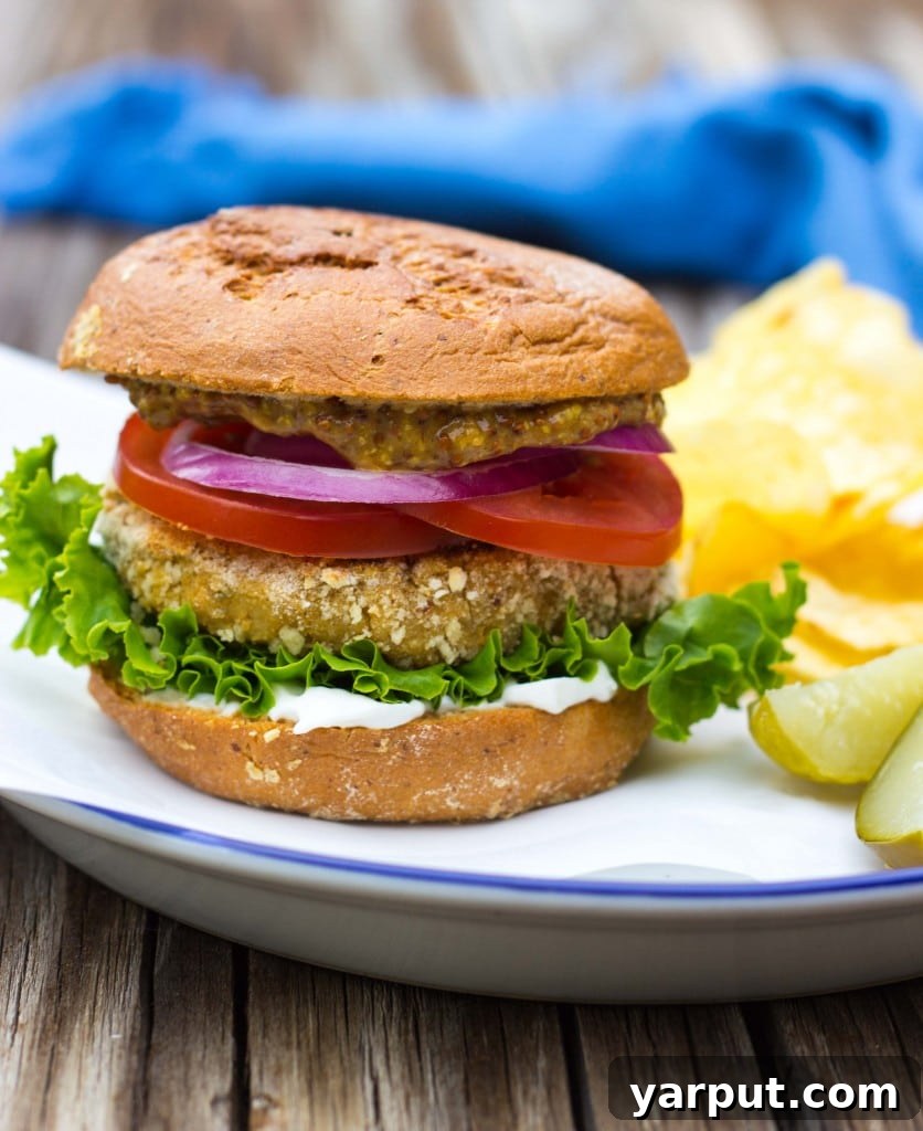 A delicious homemade vegan chicken patty sandwich with fresh toppings