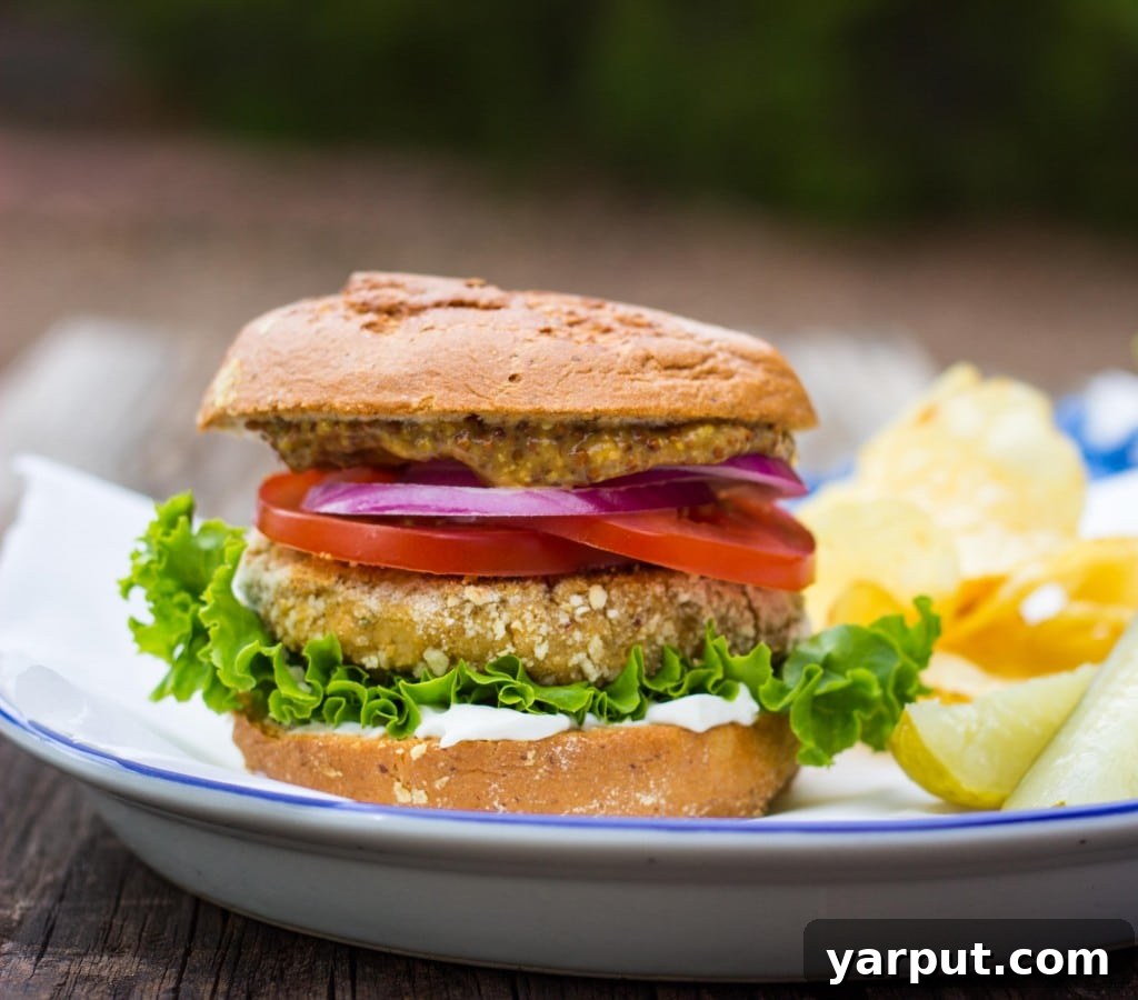 Overhead shot of two vegan chicken patty sandwiches on buns