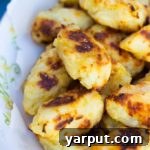 Baked Tater Tots with Smoked Gouda and Green Apple thumbnail