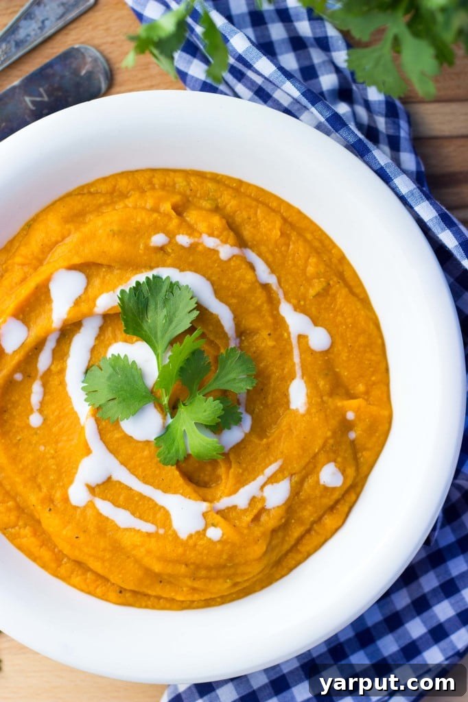 Close-up of a serving of Curried Sweet Potato, Carrot, and Red Lentil Soup