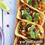 Black Eyed Pea and Sweet Potato Tacos with Pomegranate Seeds