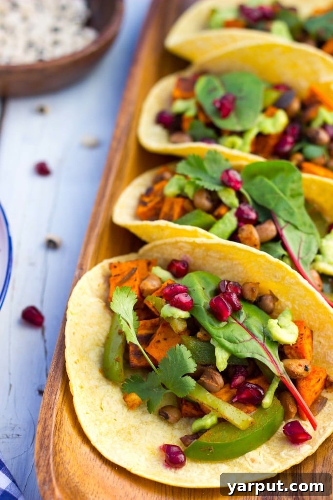 A close-up shot of the vibrant Black Eyed Pea and Sweet Potato Tacos