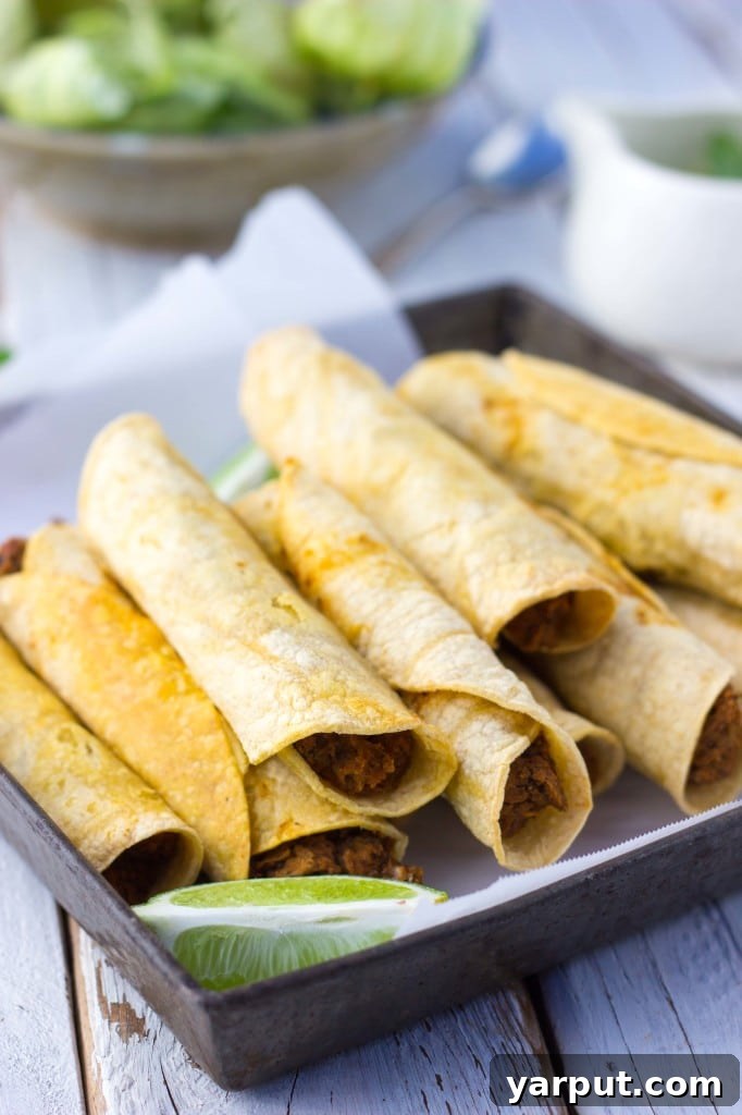 Crispy Baked Taquitos with Black Beans and Sweet Potato 5 Golden Brown Baked Sweet Potato and Black Bean Taquitos