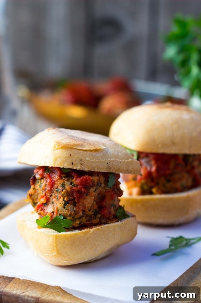 Plant-Powered Feta and Kale Sliders with White Beans 9 Another angle of the vegetarian meatball sliders, highlighting their appealing texture