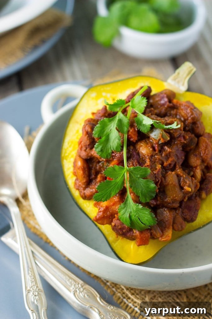 Spicy Chili Roasted Acorn Squash 11 Chili Stuffed Acorn Squash garnished with fresh herbs