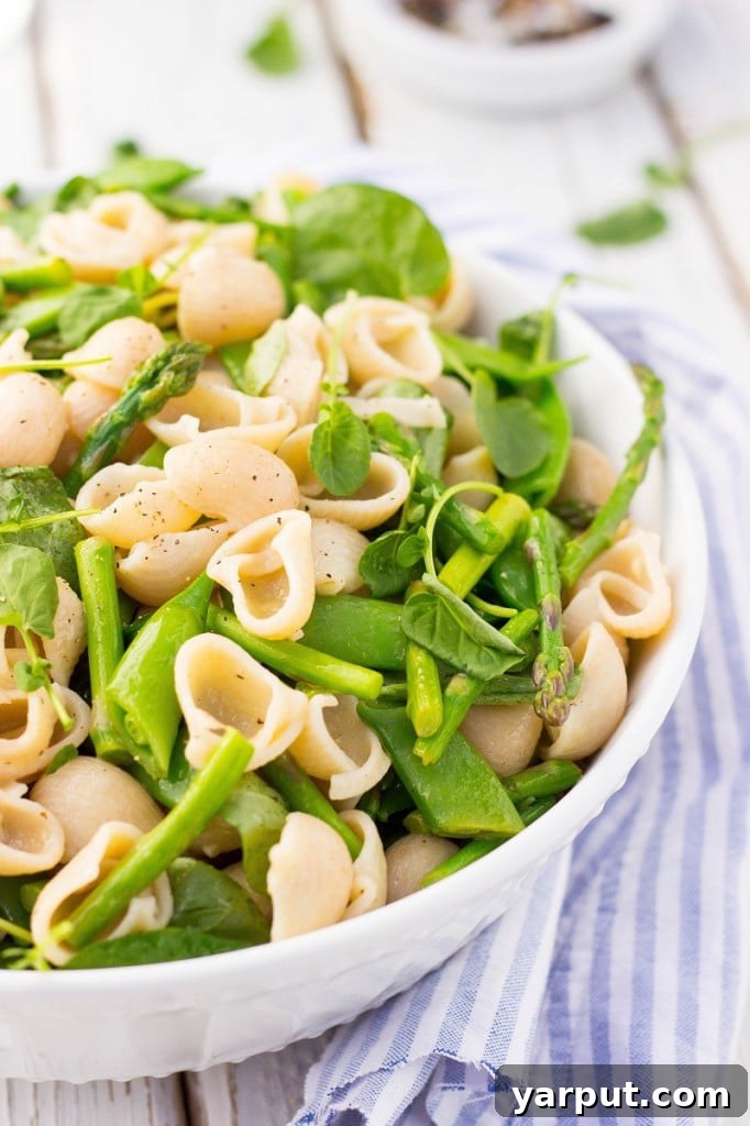 Vibrant Spring Pasta Medley 12 An overhead view of the colorful Spring Pasta Salad in a large serving bowl, highlighting its fresh and inviting presentation.
