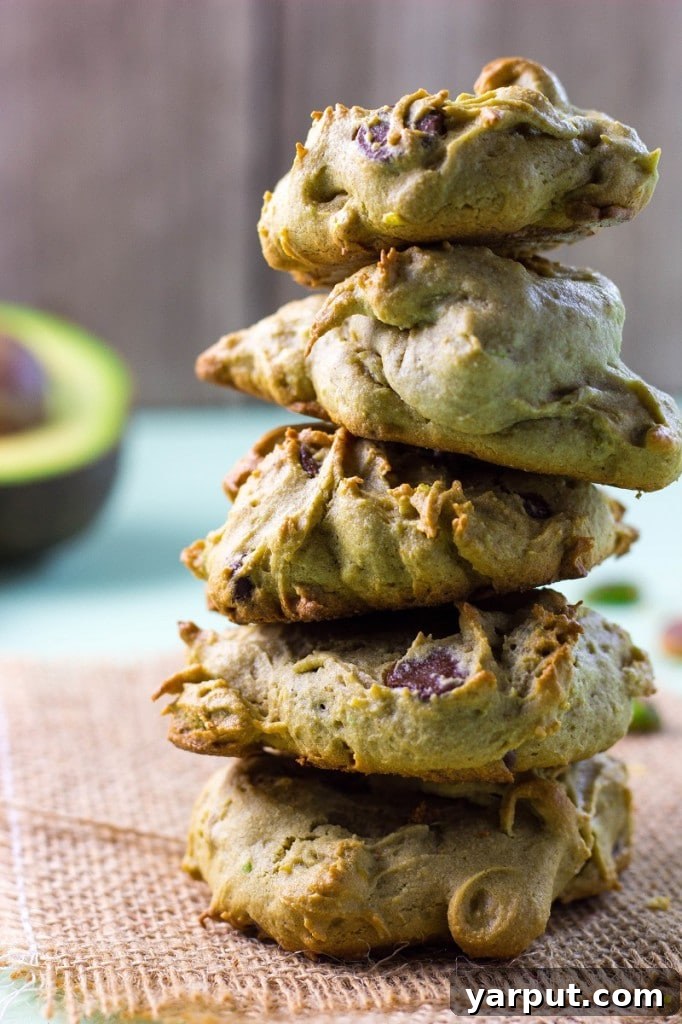 Freshly baked Avocado Cookies with visible chocolate chips and pistachios