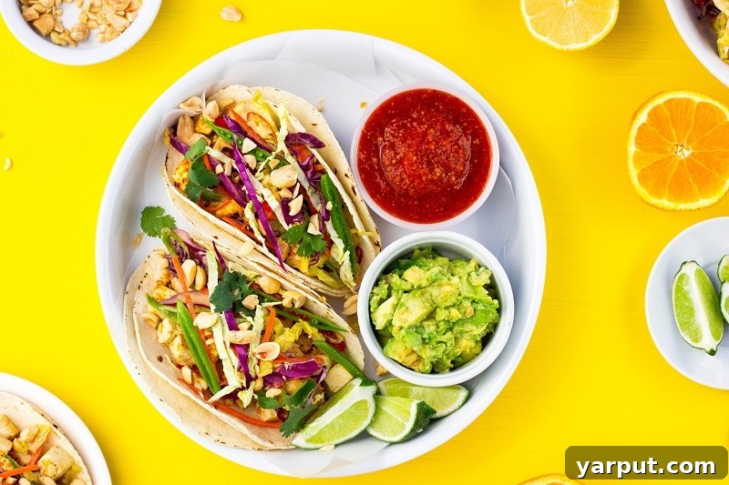 Tangy Umami Tofu Tacos 9 Two Citrus Miso Tofu Tacos garnished with fresh ingredients