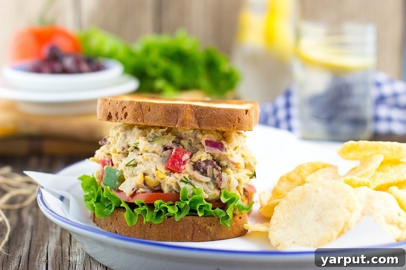 Zesty Greek Chickpea Sandwiches 7 Greek Chickpea Salad Sandwiches arranged on a platter