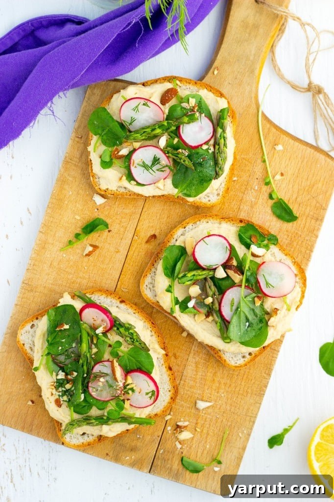 Vibrant Spring Hummus Toasts 12 Fresh Spring Toasts with Hummus - Close Up of Topping