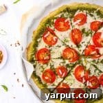 Pesto Pizza with Fresh Roma Tomatoes and Vegan Cheese