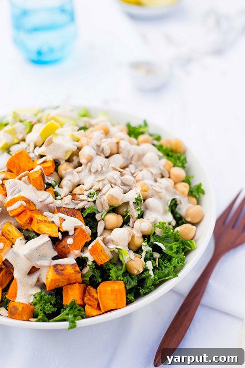 Hearty Kale Salad with Roasted Sweet Potato, Chickpeas, Avocado, and Tahini Miso Dressing 2 Nutrient-Packed Kale Salad with Roasted Sweet Potato, Chickpeas, and Creamy Tahini-Miso Dressing - A Healthy & Delicious Meal Idea