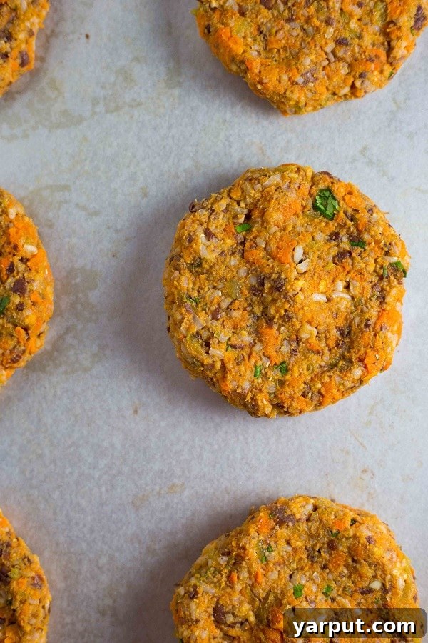 Zesty Sweet Potato Green Chili Burgers 7 Plated Green Chili and Sweet Potato Veggie Burgers with toppings