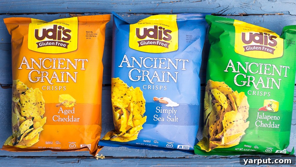 Mediterranean Loaded Hummus Bowl 3 Udi's Ancient Grain Crisps paired with Loaded Greek Hummus Dip