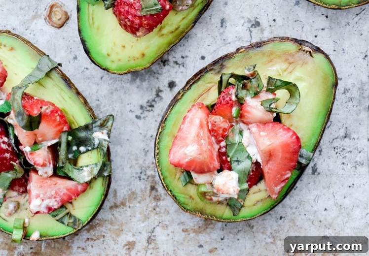 Savor Summer: 13 Vegetarian Avocado Delights 11 Warm Baked Avocados filled with a sweet and spicy strawberry salsa