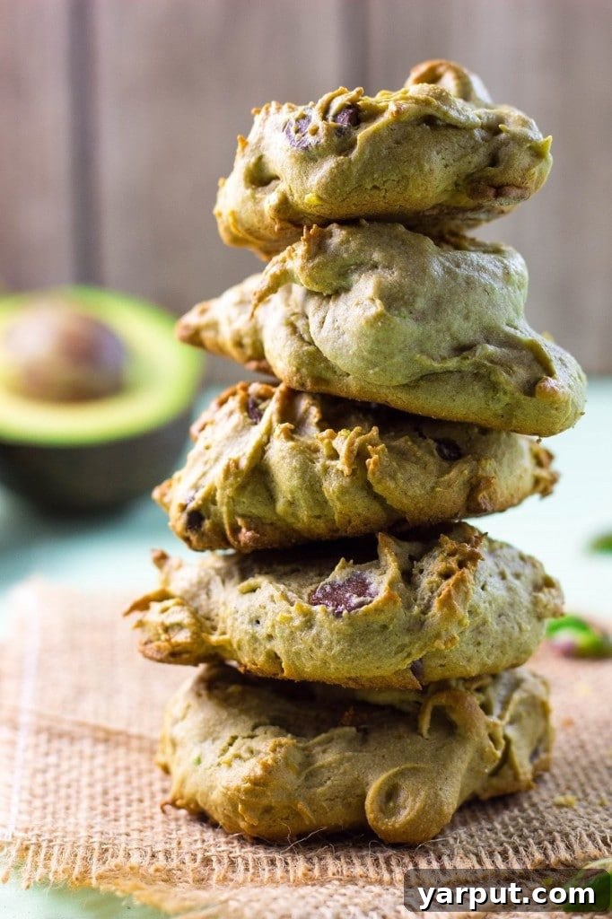 Savor Summer: 13 Vegetarian Avocado Delights 12 Green-hued Avocado Cookies with chocolate chips and pistachios