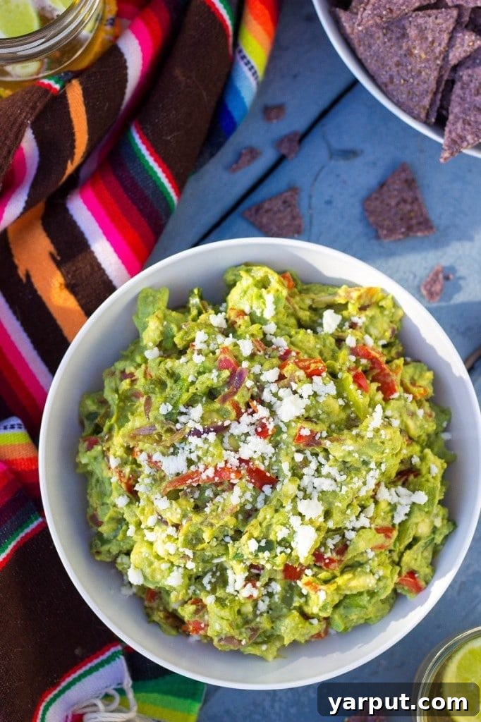 Savor Summer: 13 Vegetarian Avocado Delights 7 Zesty Fajita Guacamole with bell peppers and onions