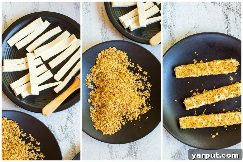 Golden Crunch Tofu Tacos with Sunny Mango Salsa 5 Tofu strips coated with tortilla chip crumbs, ready for cooking.