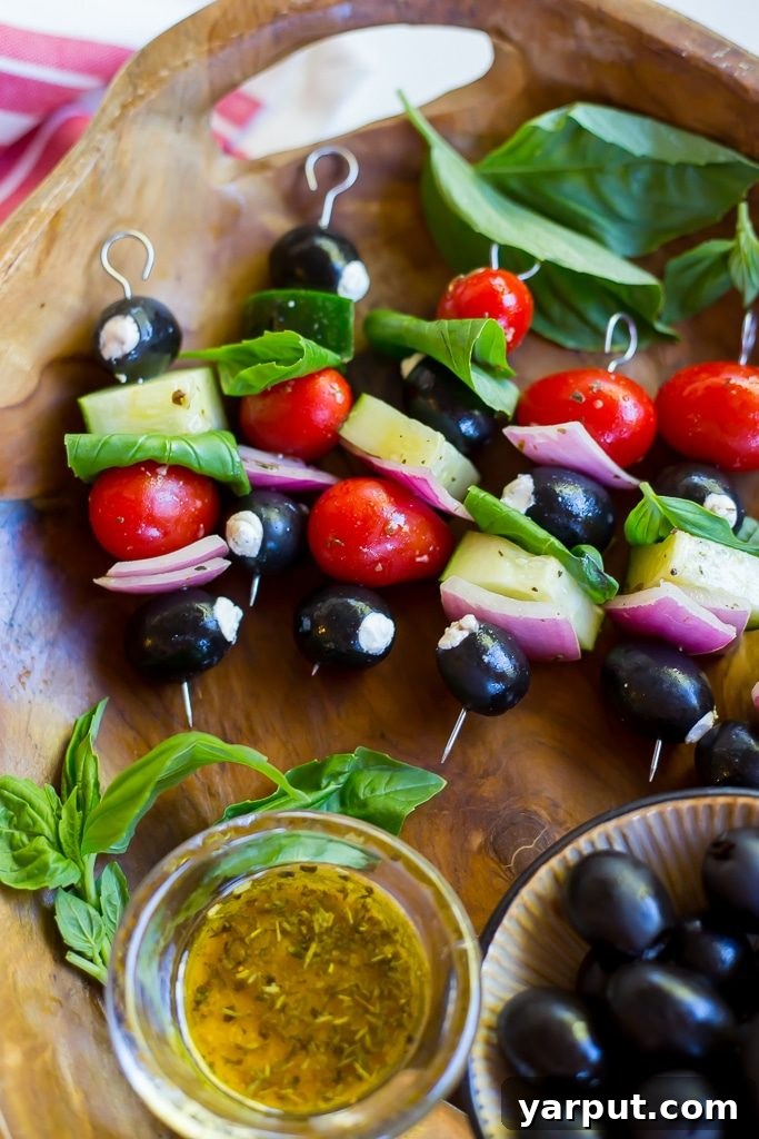 Sun-Kissed Chèvre Stuffed Olive Skewers 8 A close-up shot of the fresh ingredients used in Goat Cheese Stuffed Black Olive Mediterranean Kabobs