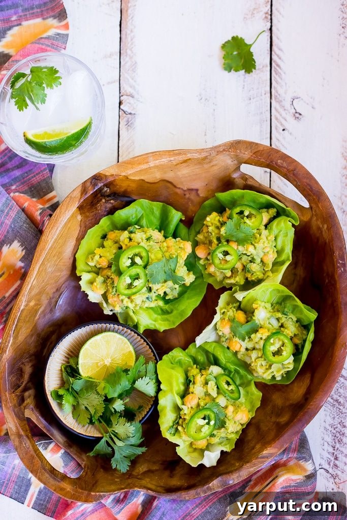 Creamy Chickpea Avocado Lettuce Bites 6 Close-up of a vibrant Chickpea Avocado Salad in a bowl, ready to be served.