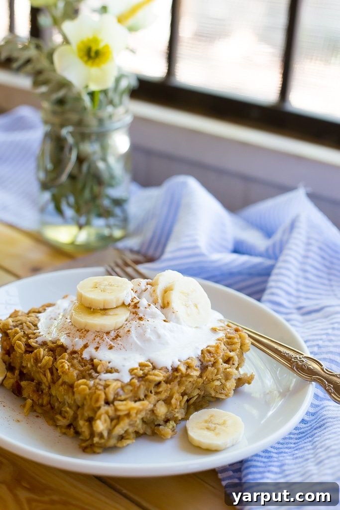 Peanut Butter Banana Baked Oats 5 Close-up of Peanut Butter and Banana Baked Oatmeal with a spoon