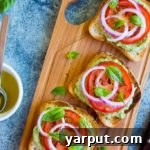 Basil Lemon and White Bean Toasts with Tomato Recipe Card Image