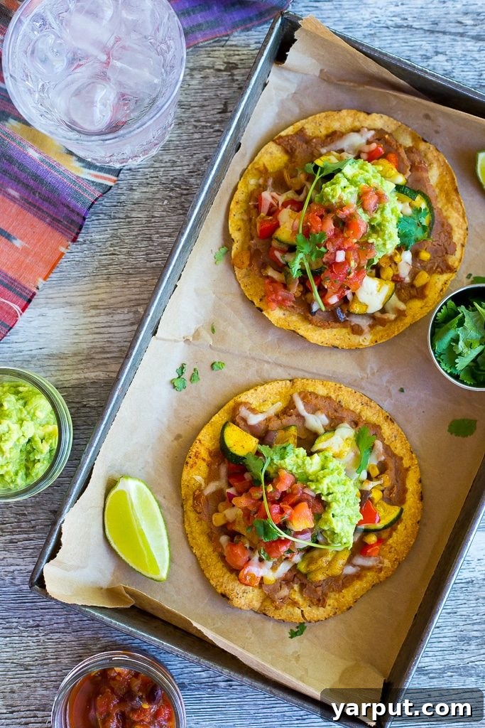 Detailed shot of the colorful vegetable topping on a Tostada.