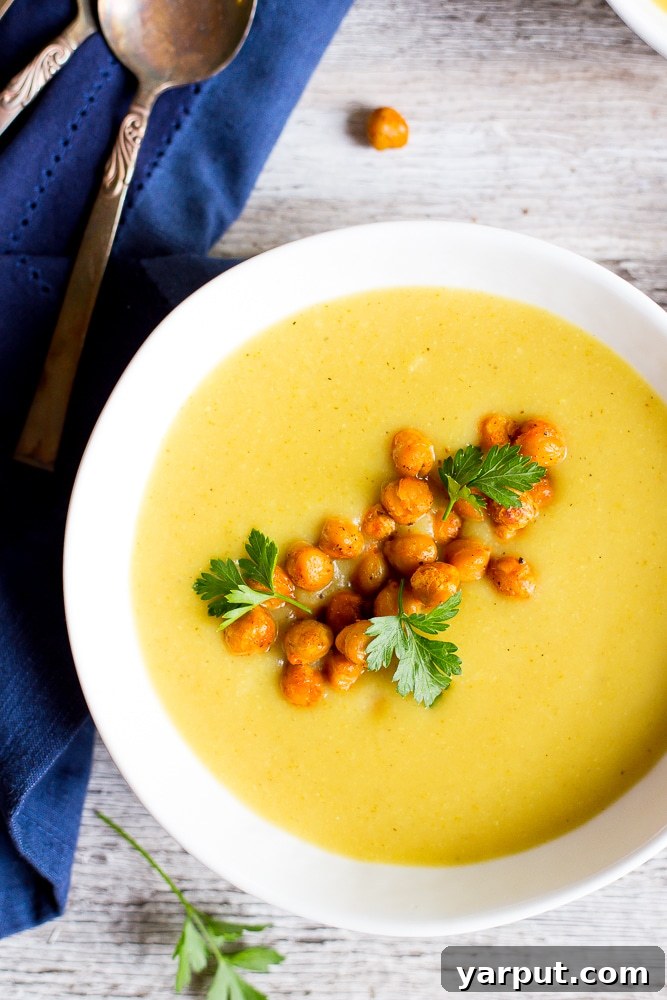 Close-up of Curried Cauliflower & Potato Soup with garnish