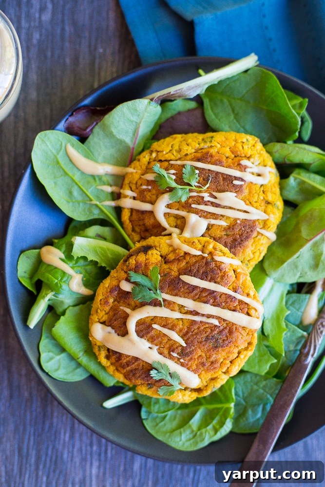 Golden Butternut Falafel with Sweet Maple Tahini Drizzle 5 Butternut Squash Falafel served with fresh salad and maple tahini sauce, a perfect vegan and gluten-free meal.