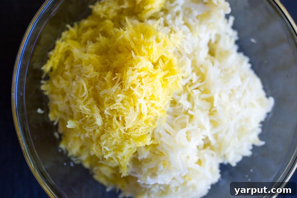 Golden Spaghetti Squash Tots with Tangy Maple Mustard 3 Spaghetti squash tater tots piled high on a serving plate with a side of maple mustard dip