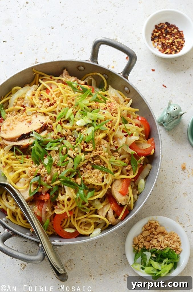 Long, stir-fried noodles symbolizing longevity for the New Year