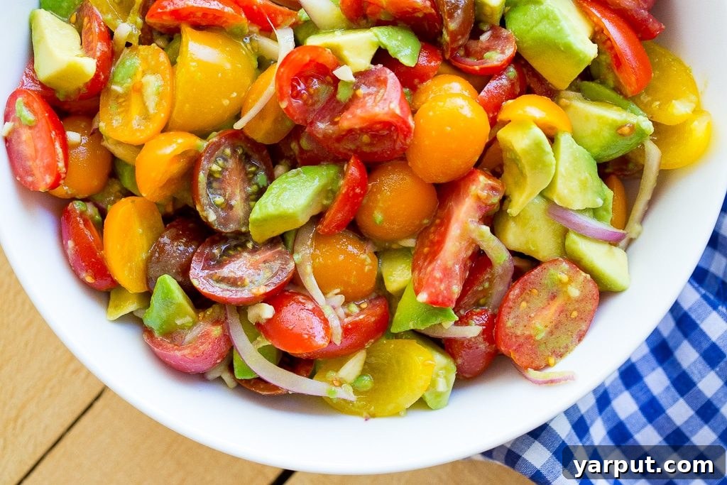 Vibrant Avocado Tomato Salad 4 This Easy Avocado and Tomato Salad is so easy to make and packed with delicous flavor! It's perfect for all your summer BBQs! {gluten free, vegan}