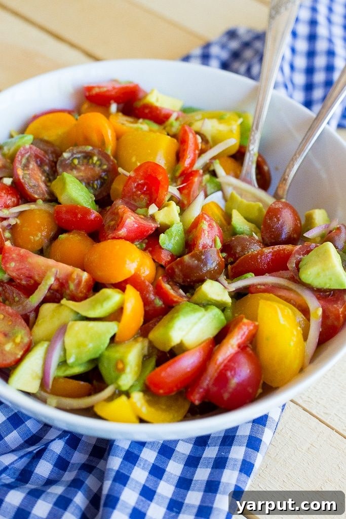 Vibrant Avocado Tomato Salad 6 This Easy Avocado and Tomato Salad is so easy to make and packed with delicous flavor! It's perfect for all your summer BBQs! {gluten free, vegan}