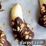 Choco-Almond Frozen Banana Bites 5 Mini Chocolate Covered Frozen Bananas with Almonds recipe card image