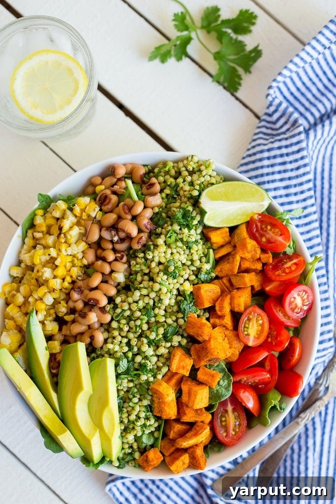 Close-up of a serving of Green Sorghum Burrito Bowls with Roasted Sweet Potato, ready to be enjoyed.